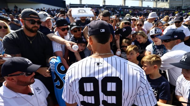 Mar 10, 2024; Tampa, Florida, USA;New York Yankees right fielder Aaron Judge (99) signs autographs prior to the game against the Atlanta Braves at George M. Steinbrenner Field.
